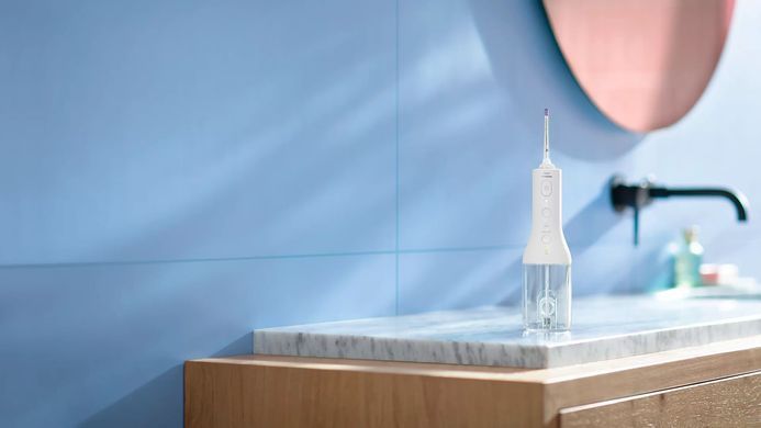 Philips Іригатор портативний Sonicare Cordless Power Flosser 3000, чаша 250 мл, чохол, 2 насадки , білий HX3826/31 фото