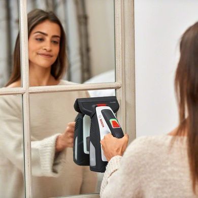 Bosch Пылесос для мытья окон GlassVAC, аккумуляторный, 3.6 В*2 Ач, контейнер 0.1Л, 0.7кг, +насадки и пульв. 0.600.8B7.000 фото