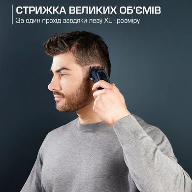 Rowenta Машинка для стрижки Barber Experience, сеть+акум., роторный мотор DC, насадок-12, кейс, нерж. сталь, синий TN1551E0 фото
