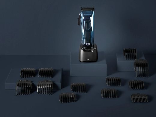Rowenta Машинка для стрижки Barber Experience, сеть+акум., роторный мотор DC, насадок-12, кейс, нерж. сталь, синий TN1551E0 фото