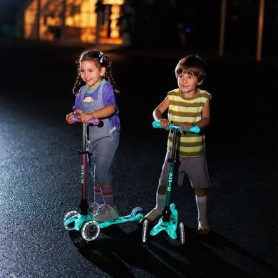 Самокат MICRO серии "Mini Deluxe Foldable Orion Glow LED" &ndash; РОЗОВЫЙ (складной, до 50 кг (kg), 3-х колесный) MMD373 фото
