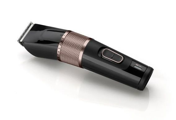 BaByliss Машинка для стрижки, сеть+акум., вибрационный мотор, насадок-1, сталь, черно-розовый E973E фото