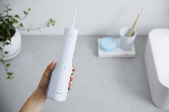 Panasonic Ирригатор Panasonic портативний, чаша 200 мл, Li-ion аккум. в компл., 2 насадки, светло голубой EW-DJ26-A321 фото