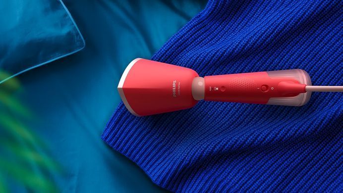 Philips Отпариватель компактный Series 5000, 1400Вт, 120мл, паровой удар -24гр, складная ручка, чехол-перчатка, пластик, красный STH5020/40 фото