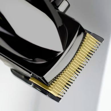BaByliss Машинка для стрижки Super-X Metal Series, акум., насадок-12, быстрая заряд, сумка для хранения, сталь с графитовим покрытием, чорно-серебр. E991E фото