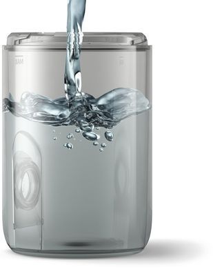 Philips Ирригатор Sonicare Cordless Power Flosser 3000 портативний, чаша 250 мл, чехол, 2 насадки , черный HX3826/33 фото