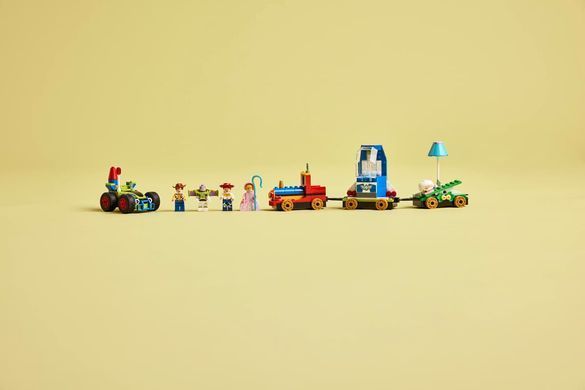 LEGO Конструктор LEGO Disney Pixar Святкування з Історії Іграшок: потяг і авто для перегонів 43264 фото