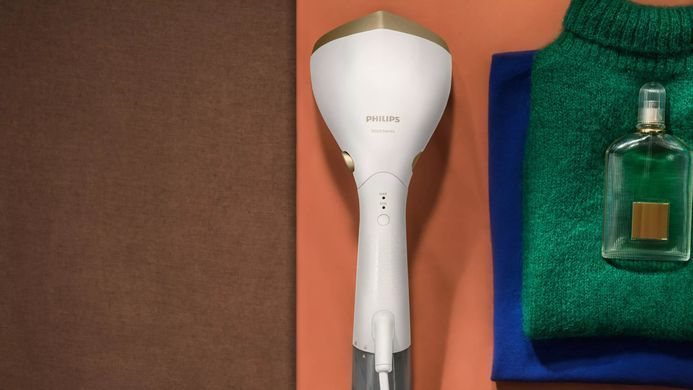 Philips Отпариватель компактный Series 7000, 1500Вт, 100 и 200мл, паровой удар -28гр, перчатка, чехол, нерж. сталь, белый STH7030/10 фото