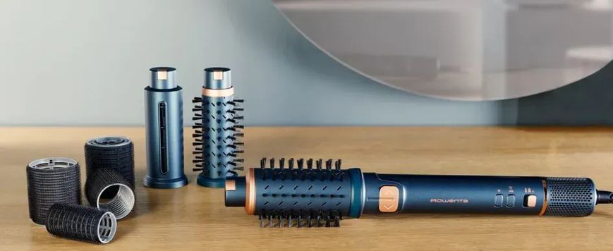Rowenta Фен-щітка Rowenta Air Rotate, 1300Вт, 4 режими, іоніз-я, хол. обдув, функція фену, 3 насадки, кераміка, чорно-золотий UB9920E0 фото